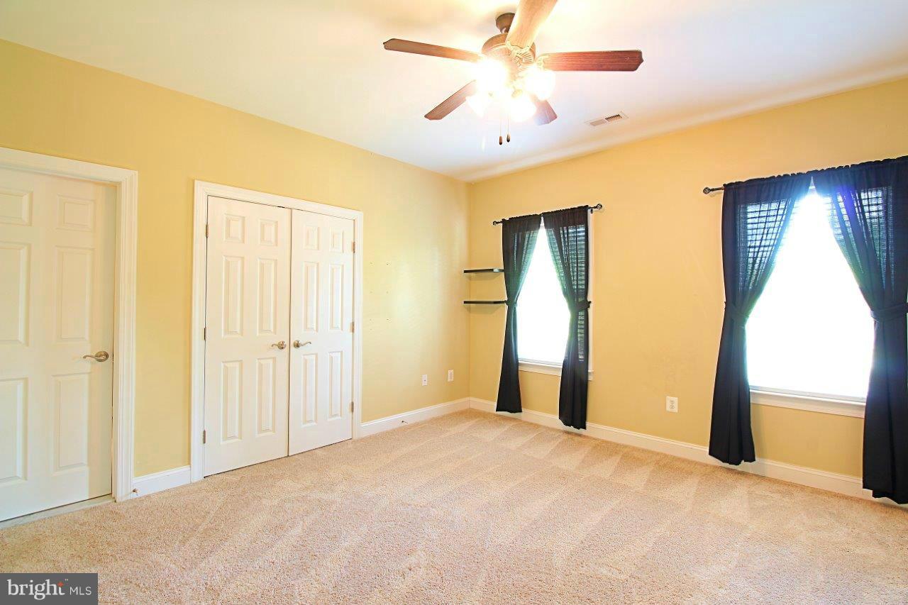 68 Willow Ridge Court Fredericksburg, VA 22406 - Photo 27 of 30 a view of a livingroom with a chandelier fan