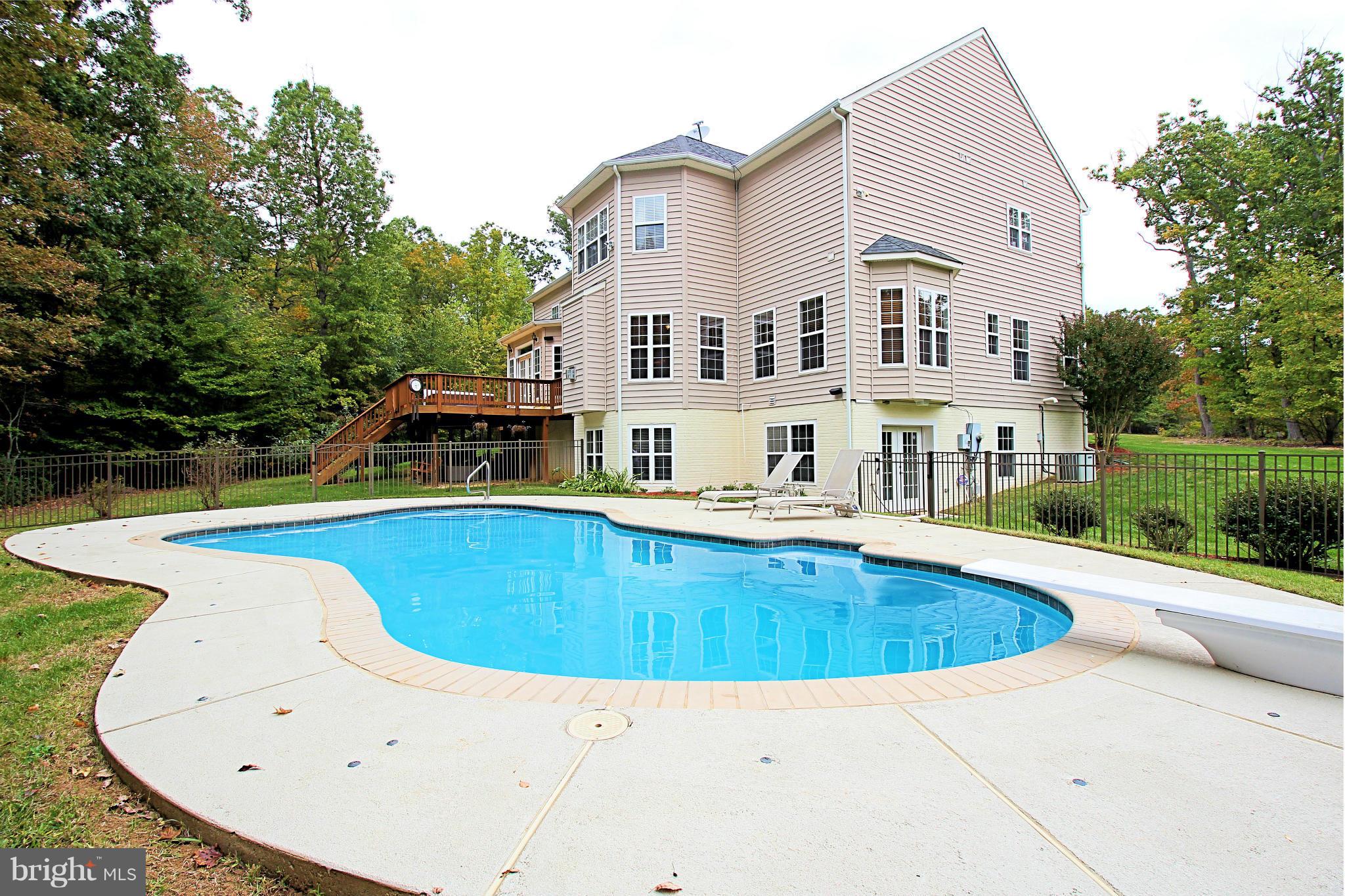 68 Willow Ridge Court Fredericksburg, VA 22406 - Photo 4 of 30 a view of a house with swimming pool