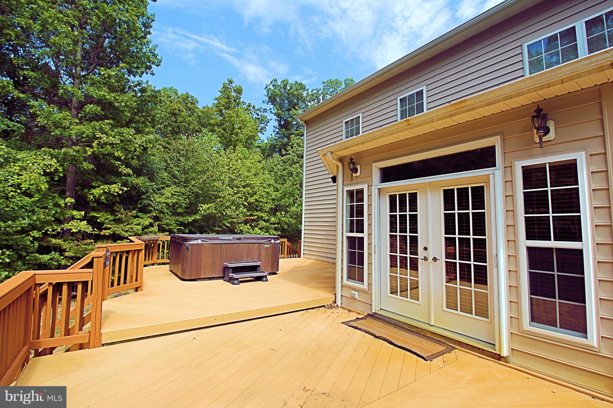 68 Willow Ridge Court Fredericksburg, VA 22406 - Photo 5 of 30 a view of a patio with table and chairs