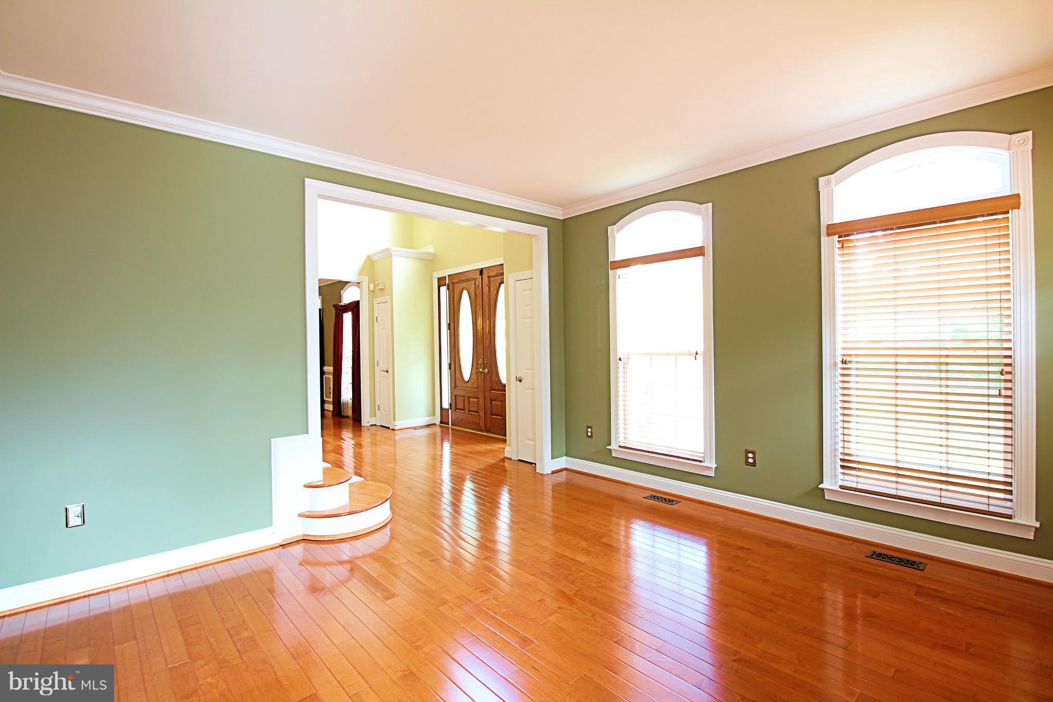 68 Willow Ridge Court Fredericksburg, VA 22406 - Photo 8 of 30 a view of empty room with wooden floor and fan