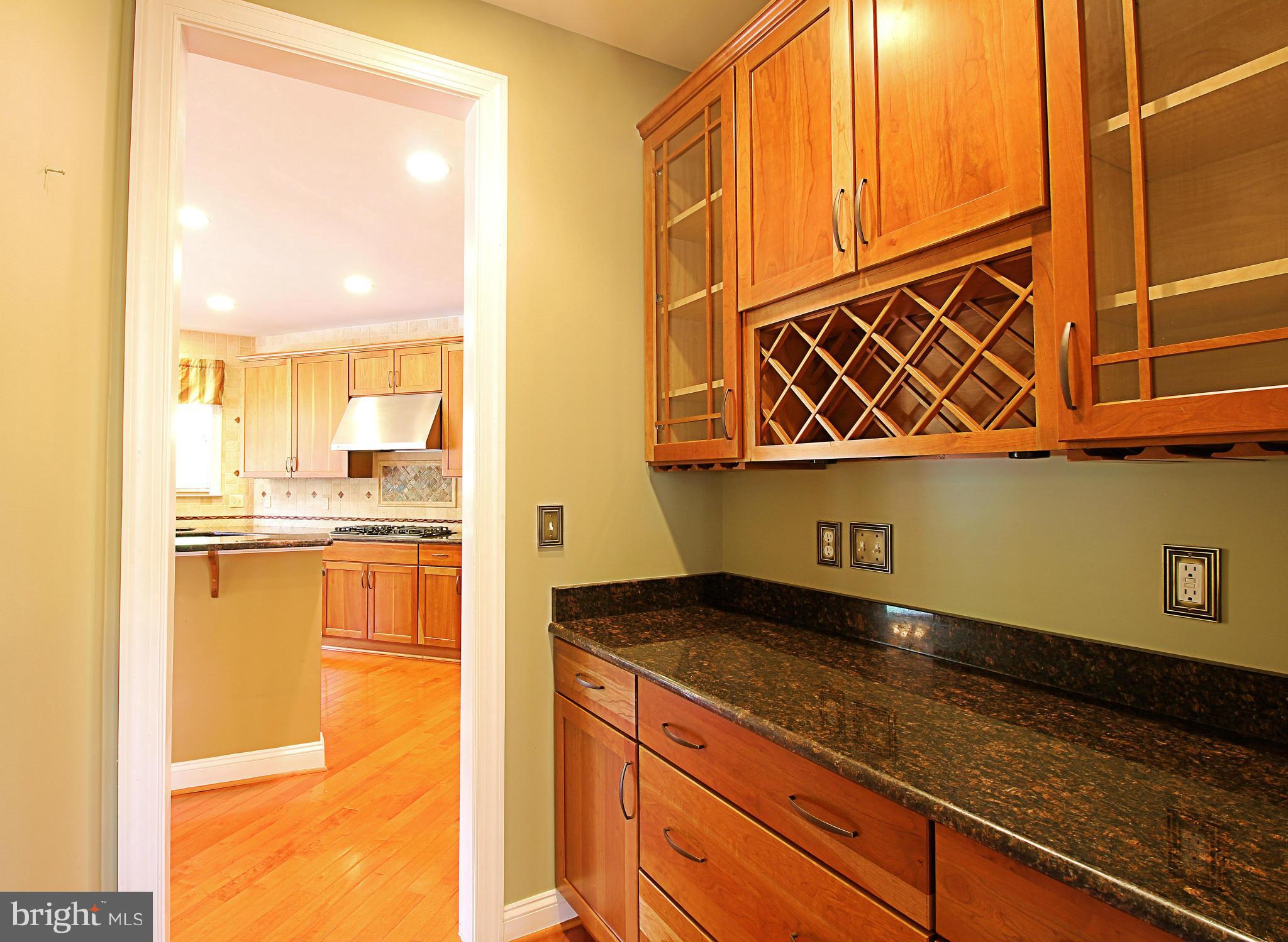 68 Willow Ridge Court Fredericksburg, VA 22406 - Photo 10 of 30 a kitchen with a sink and a refrigerator