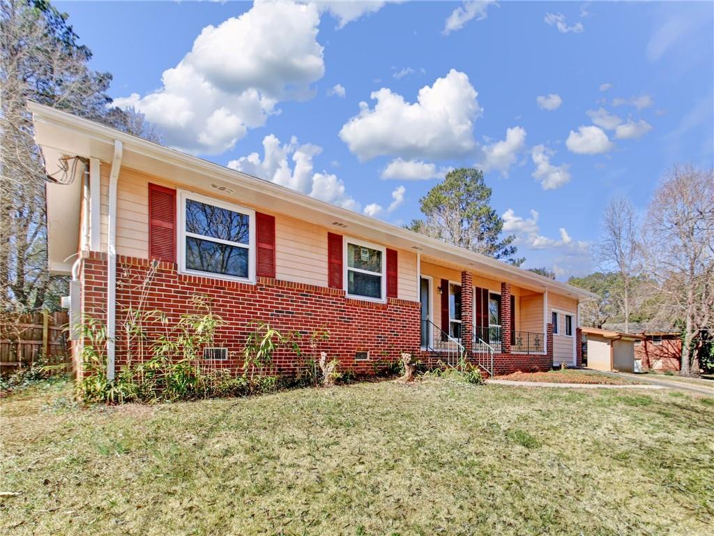 6381 Maddox Road Morrow, GA 30260 - Photo 1 of 1 a view of a house with a yard