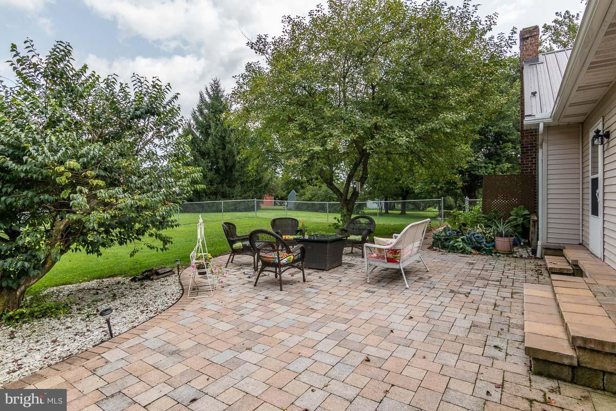 3125 Roxbury Road Shippensburg, PA 17257 - Photo 19 of 24 Rear paver patio with fenced yard