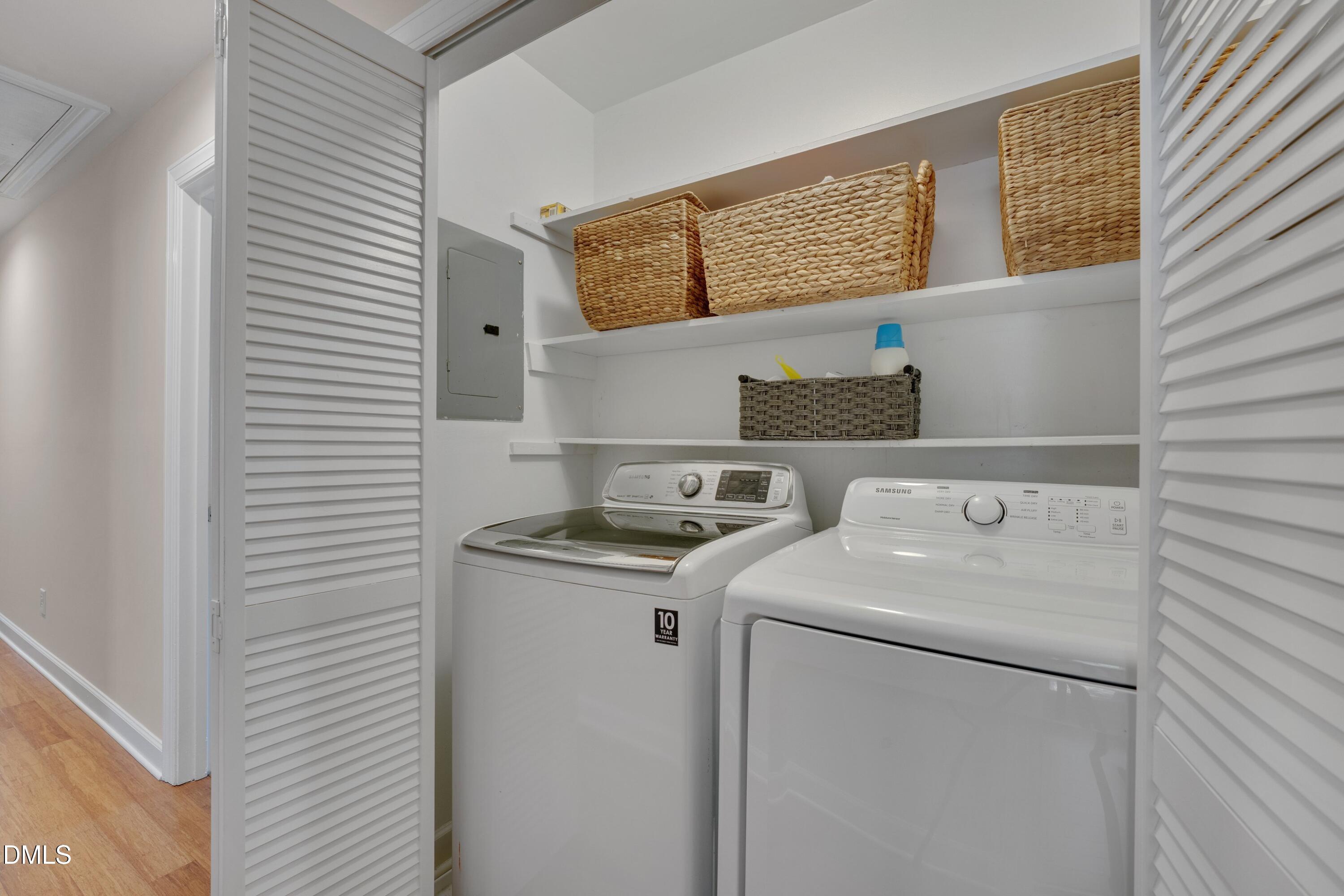 7900 Kingsland Drive Raleigh, NC 27613 - Photo 32 of 32 a utility room with dryer and washer