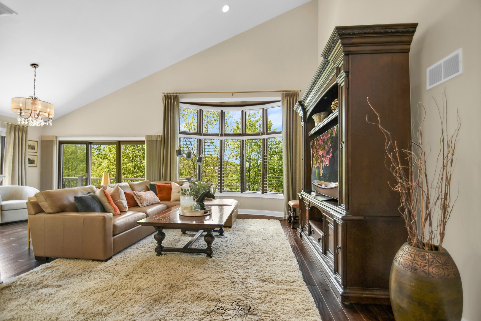 14406 Lake Ridge Road Orland Park, IL 60462 - Photo 18 of 35 a living room with furniture and a floor to ceiling window