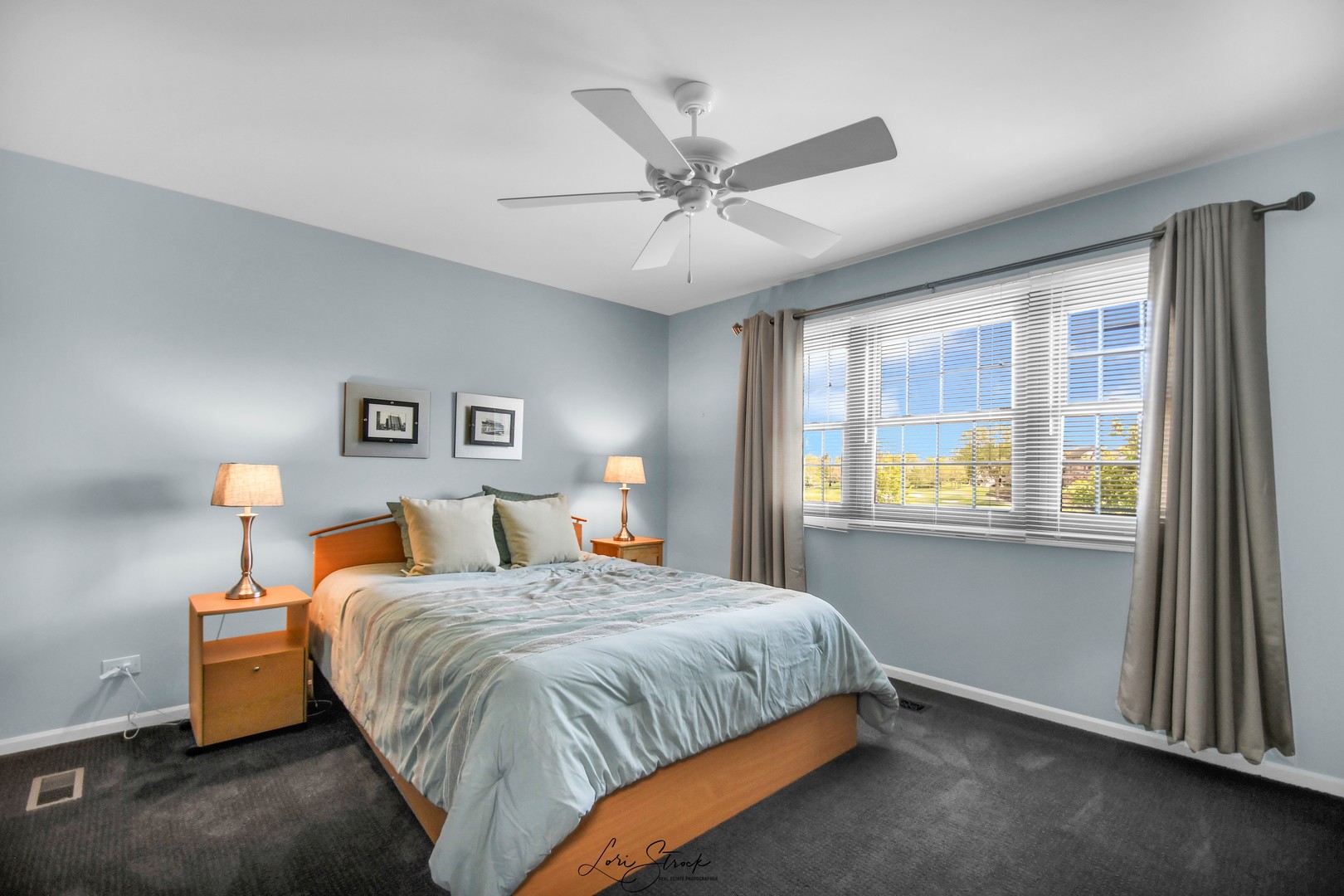 14406 Lake Ridge Road Orland Park, IL 60462 - Photo 23 of 35 a bedroom with bed and window