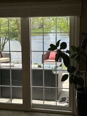 14406 Lake Ridge Road Orland Park, IL 60462 - Photo 33 of 35 a room with furniture and floor to ceiling window