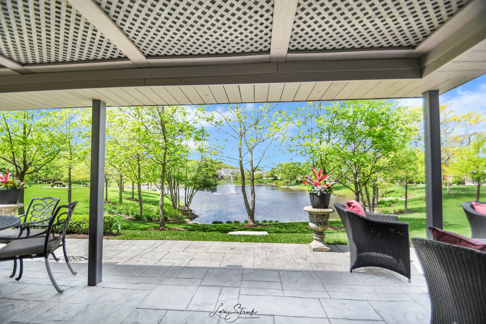 14406 Lake Ridge Road Orland Park, IL 60462 - Photo 6 of 35 a wooden bench sitting in front of a building