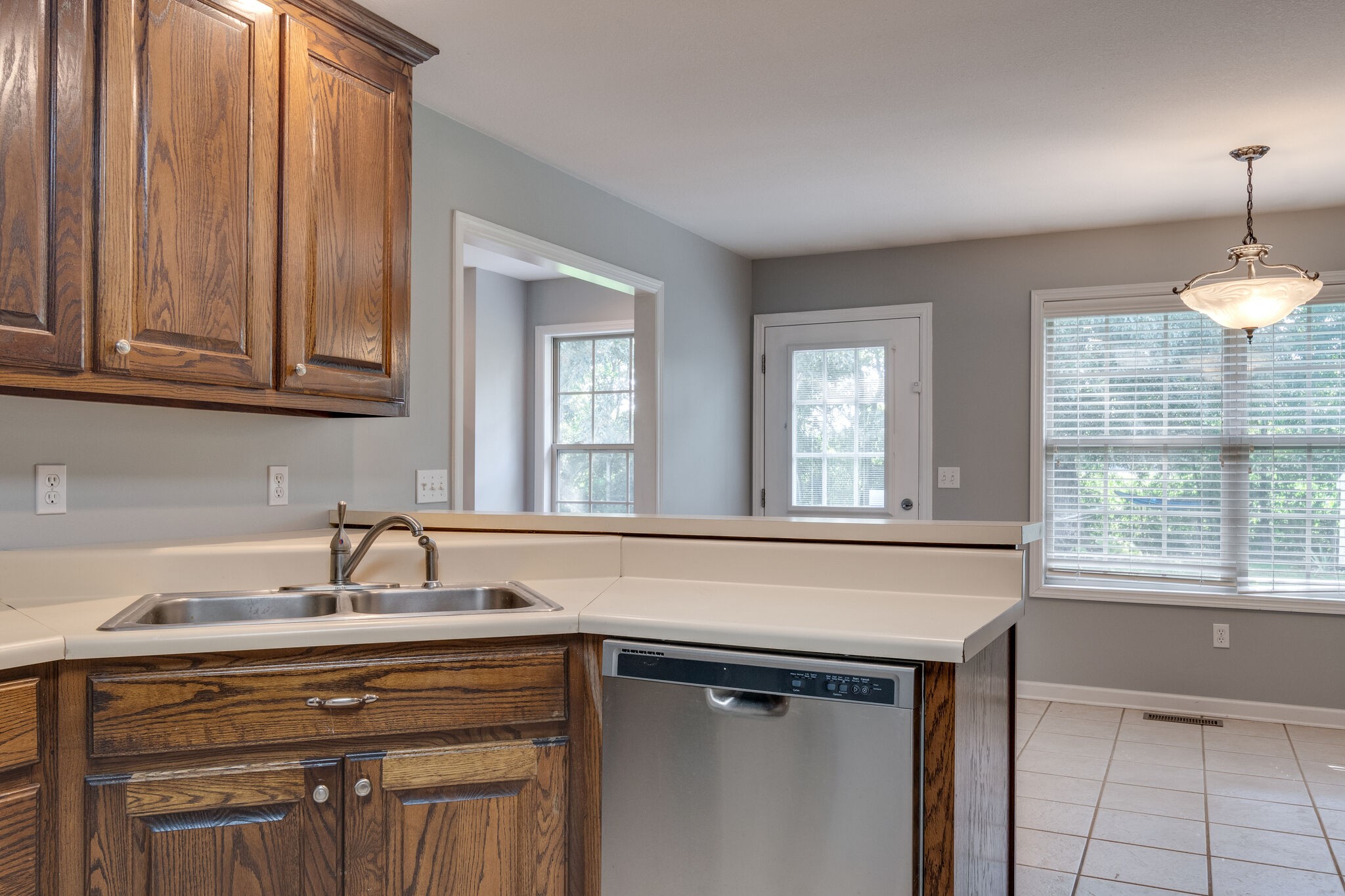 79 Jeans Road Fayetteville, TN 37334 - Photo 15 of 31 a kitchen with stainless steel appliances granite countertop a sink and a cabinets