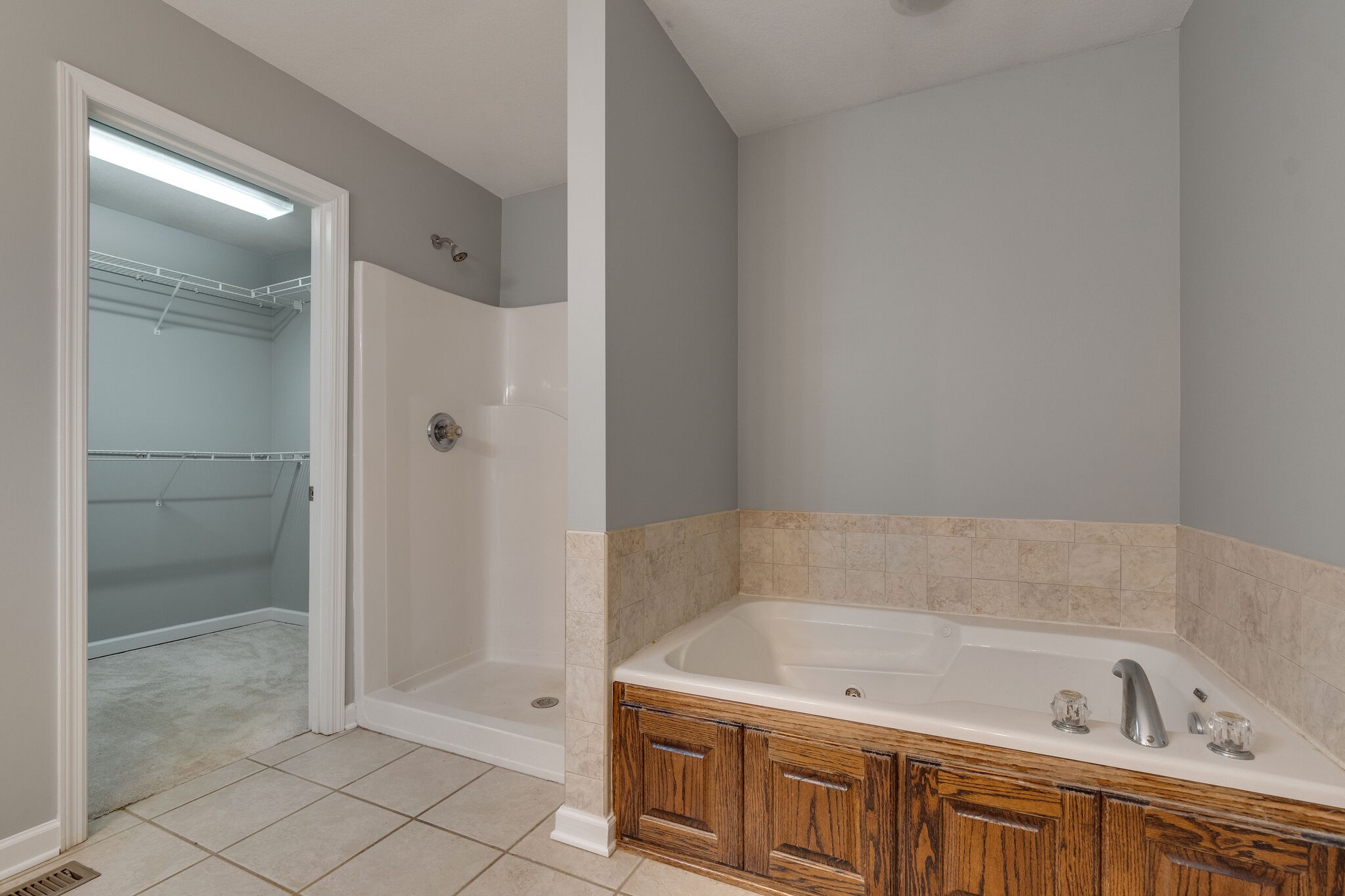 79 Jeans Road Fayetteville, TN 37334 - Photo 22 of 31 a bathroom with a tub a sink and a shower