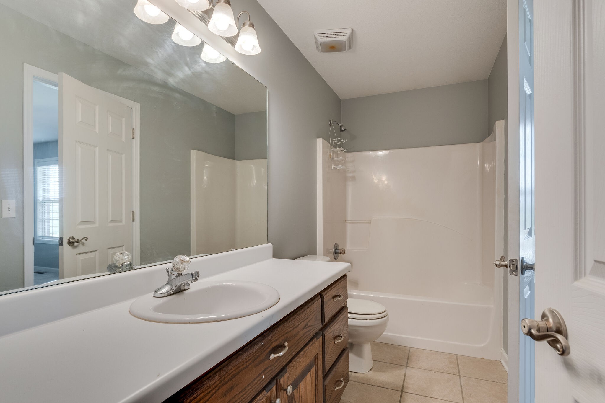79 Jeans Road Fayetteville, TN 37334 - Photo 25 of 31 a bathroom with a sink a toilet and shower