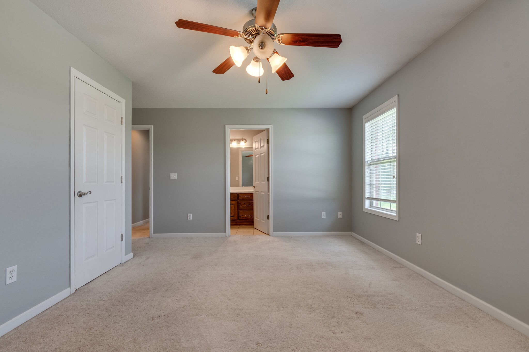 79 Jeans Road Fayetteville, TN 37334 - Photo 26 of 31 an empty room with windows and fan