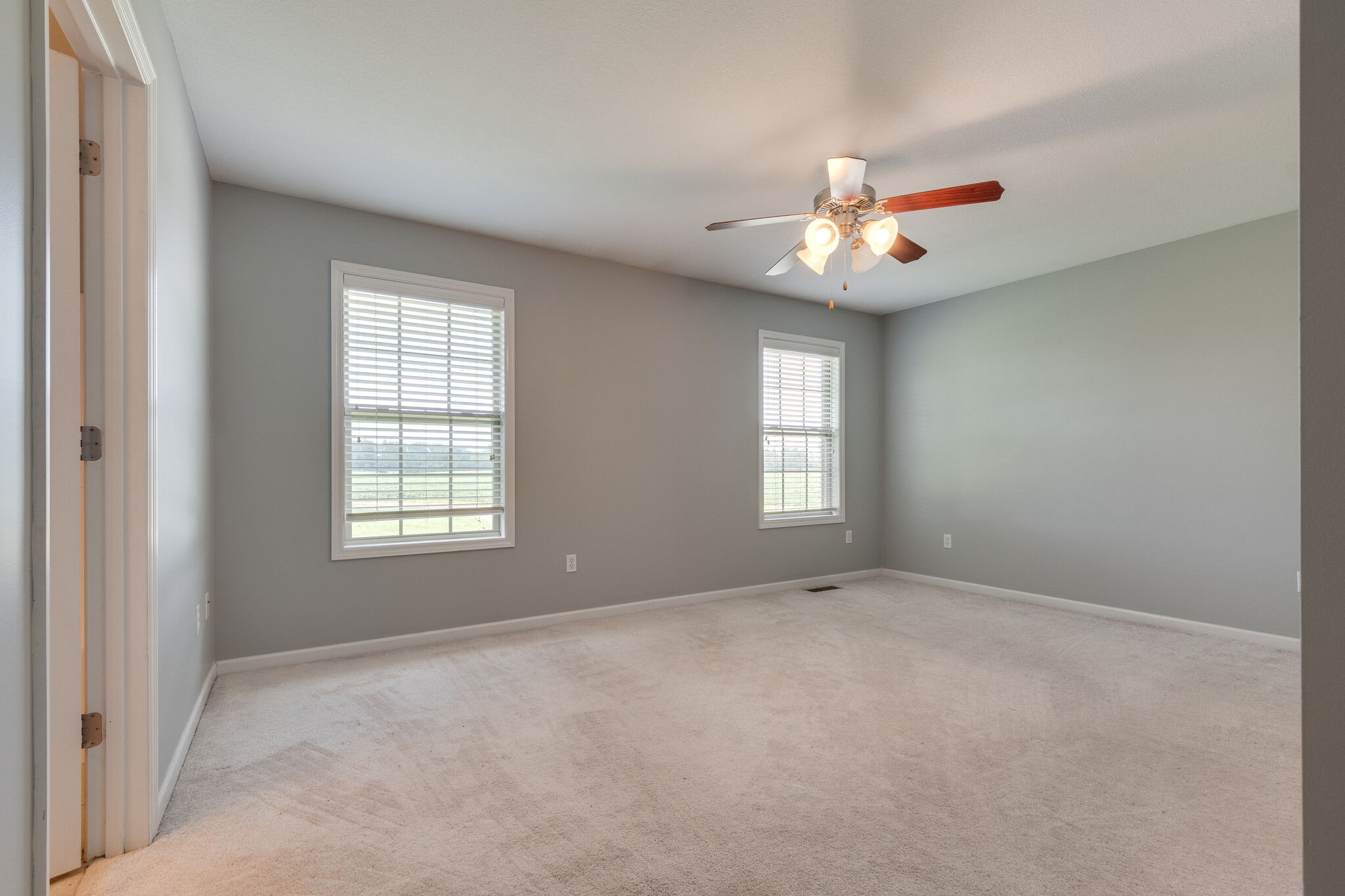79 Jeans Road Fayetteville, TN 37334 - Photo 27 of 31 an empty room with windows and fan