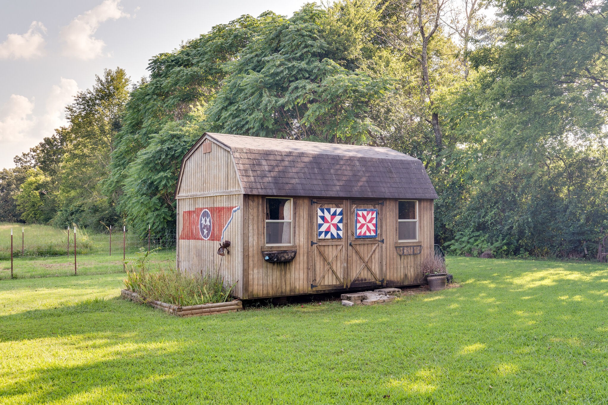 79 Jeans Road Fayetteville, TN 37334 - Photo 28 of 31 a view of a tiny house with garden