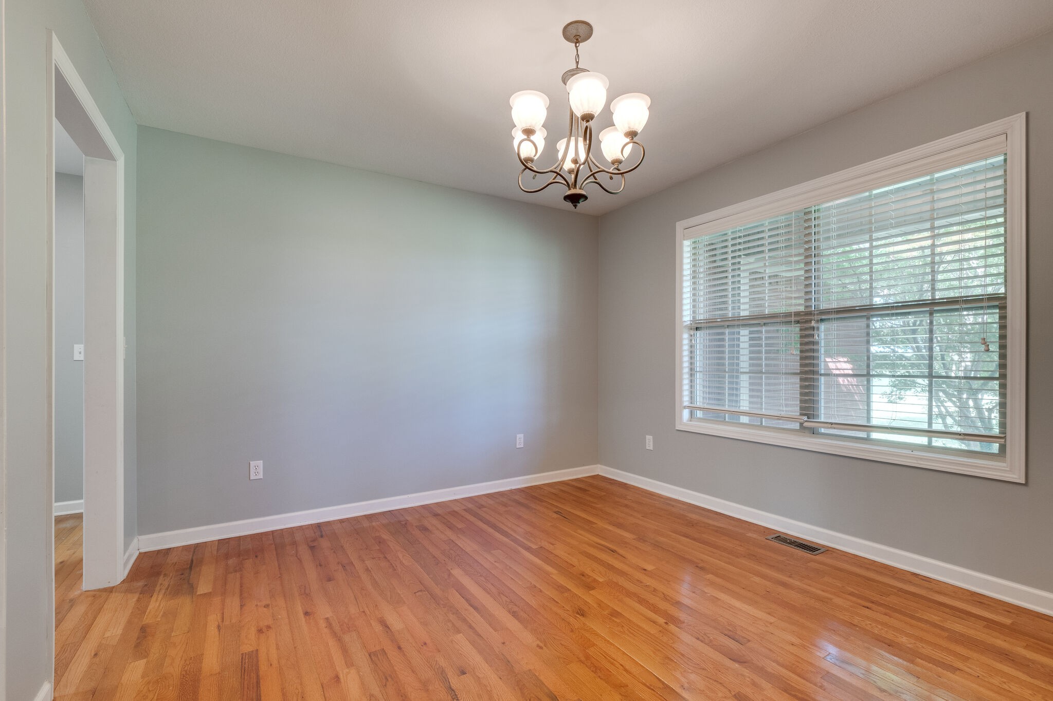 79 Jeans Road Fayetteville, TN 37334 - Photo 8 of 31 wooden floor in an empty room with a window