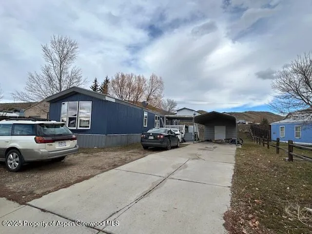a car parked in front of a house