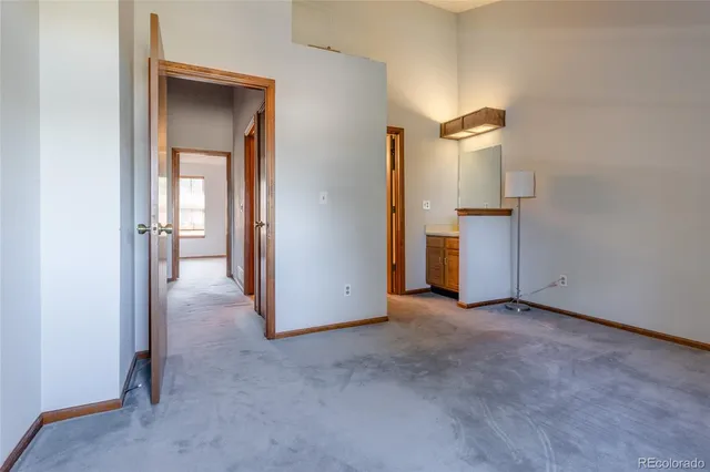 a view of a room with a hallway