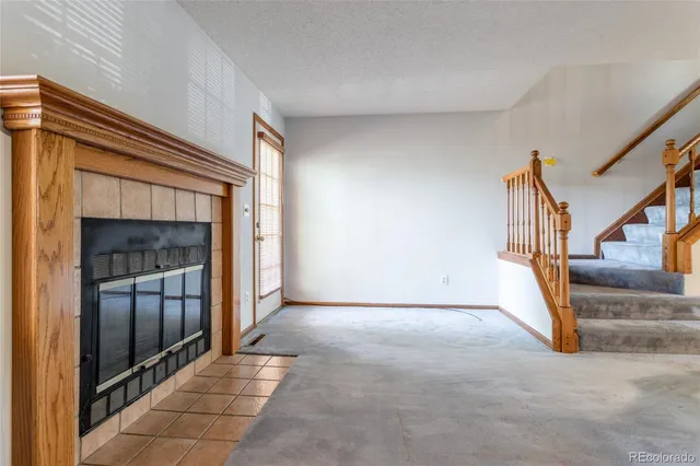 a view of a hallway with staircase