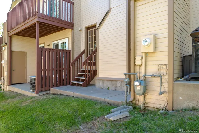a view of a backyard with porch