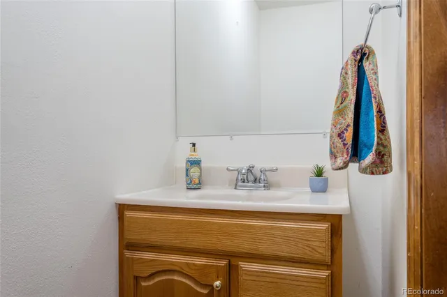 a view of an empty room with a door