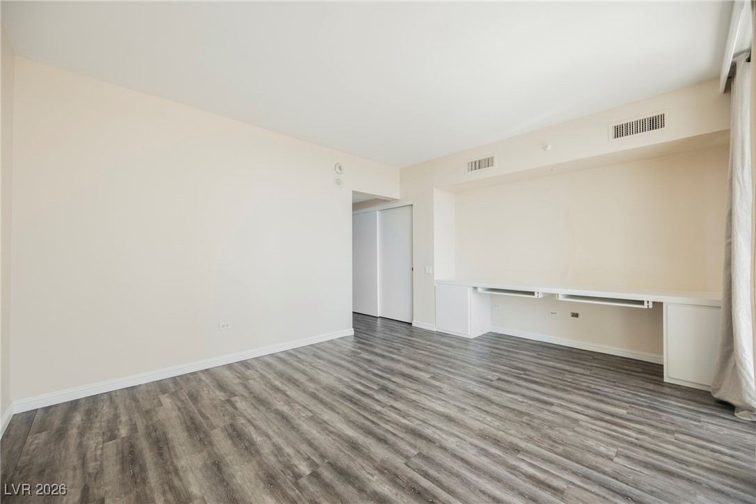 2877 Paradise Road, Unit 1604 Las Vegas, NV 89109 - Photo 22 of 47 Spare room with wood finished floors