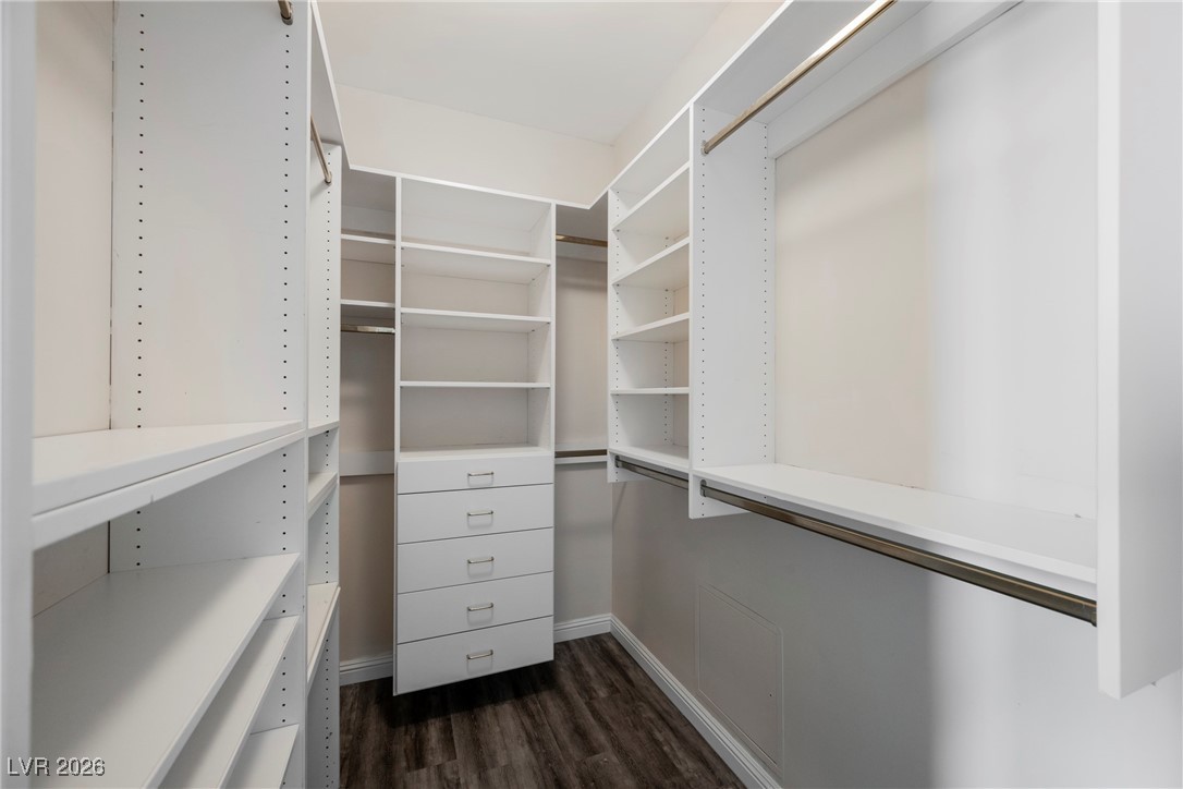 2877 Paradise Road, Unit 1604 Las Vegas, NV 89109 - Photo 23 of 47 Spacious closet with dark wood-style floors