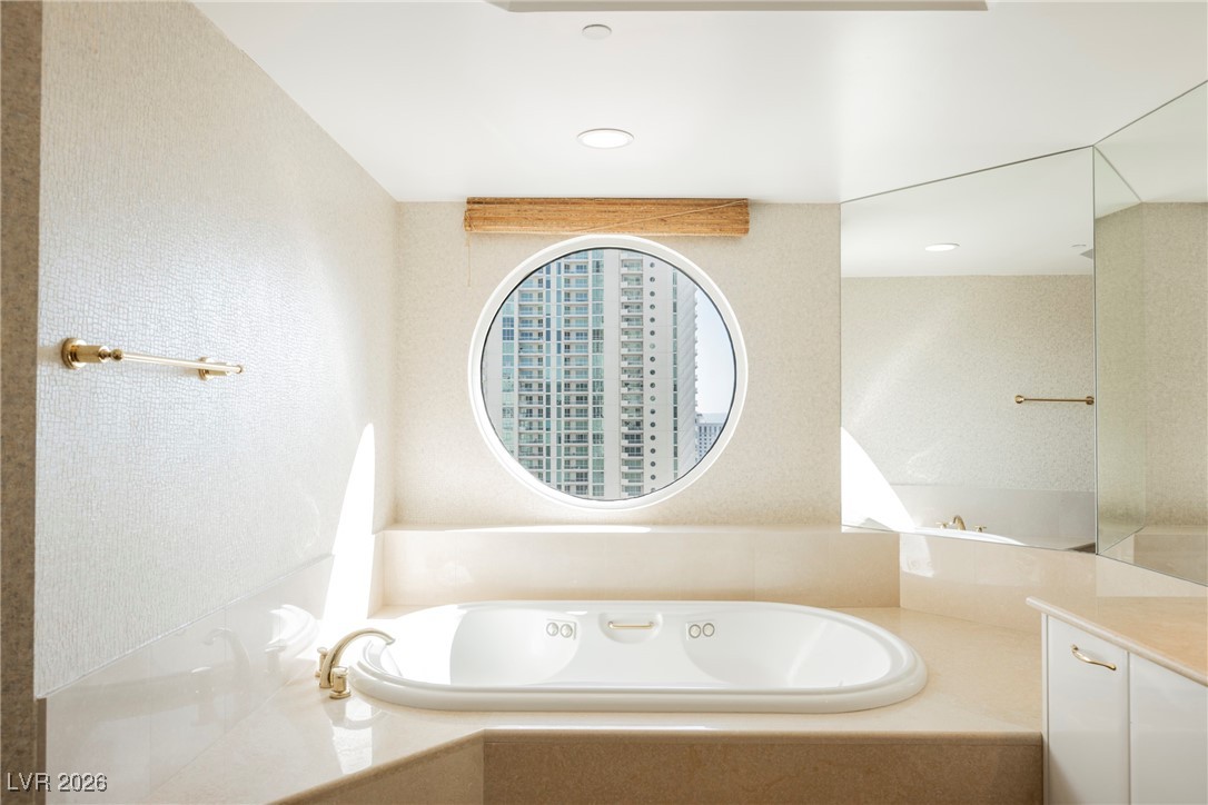 2877 Paradise Road, Unit 1604 Las Vegas, NV 89109 - Photo 28 of 47 Bathroom with vanity and a garden tub