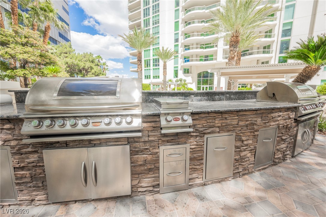2877 Paradise Road, Unit 1604 Las Vegas, NV 89109 - Photo 36 of 47 View of patio / terrace with an outdoor kitchen