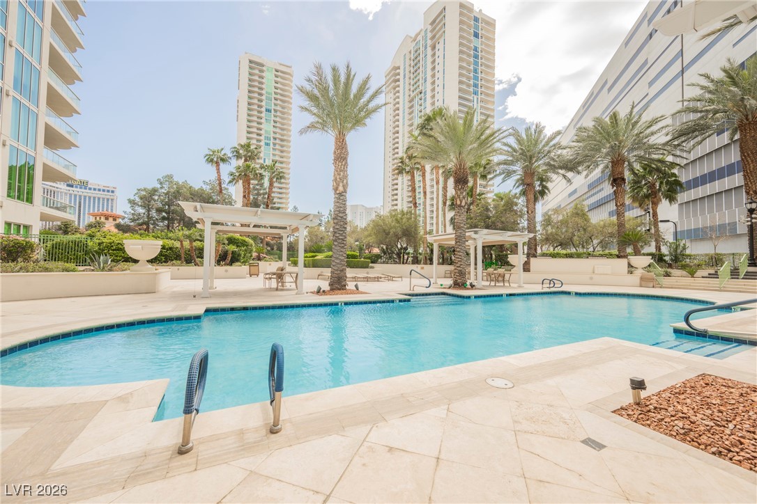 2877 Paradise Road, Unit 1604 Las Vegas, NV 89109 - Photo 40 of 47 Community pool with a pergola and a patio