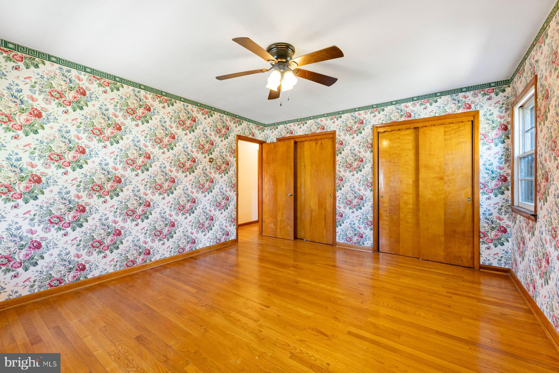 104 Hillside Road Baltimore, MD 21228 - Photo 28 of 34 a view of an empty room with a window