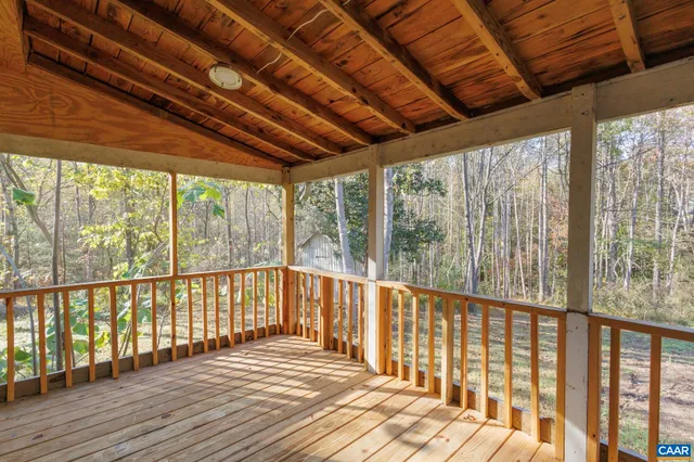 a view of a yard with trees
