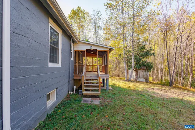 a view of outdoor space with trees all around