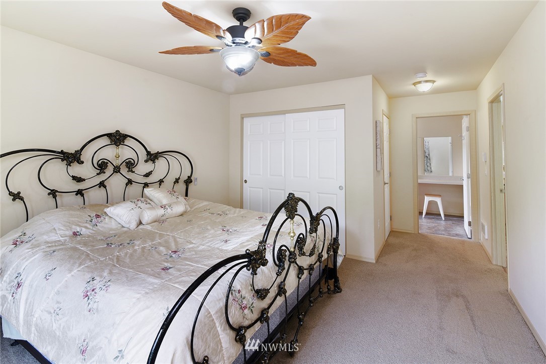 1450 Southeast Spruce Road Port Orchard, WA 98367 - Photo 18 of 40 a view of a livingroom with a chandelier