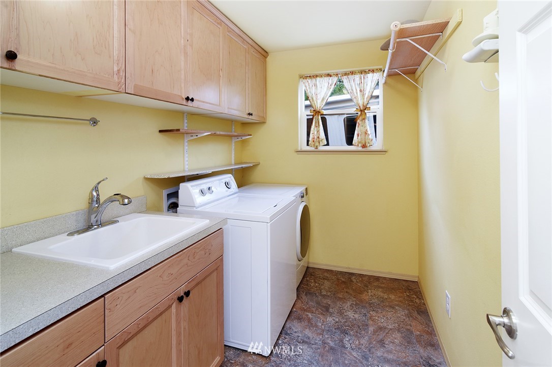 1450 Southeast Spruce Road Port Orchard, WA 98367 - Photo 22 of 40 a utility room with a sink
