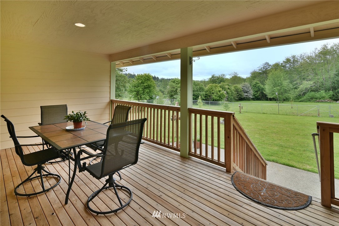1450 Southeast Spruce Road Port Orchard, WA 98367 - Photo 24 of 40 a view of a two chairs in the roof deck