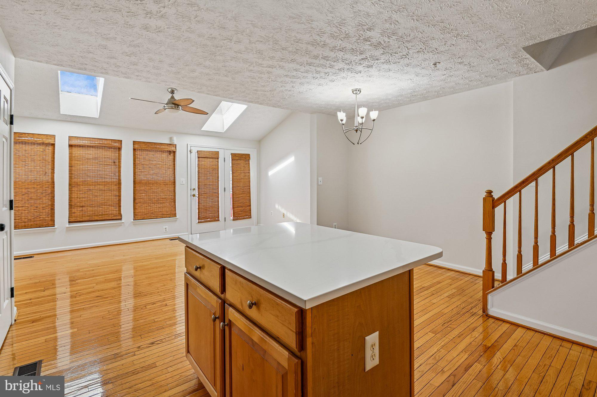 2670 Rainy Spring Court Odenton, MD 21113 - Photo 15 of 79 a view of a hallway with entryway and wooden floor