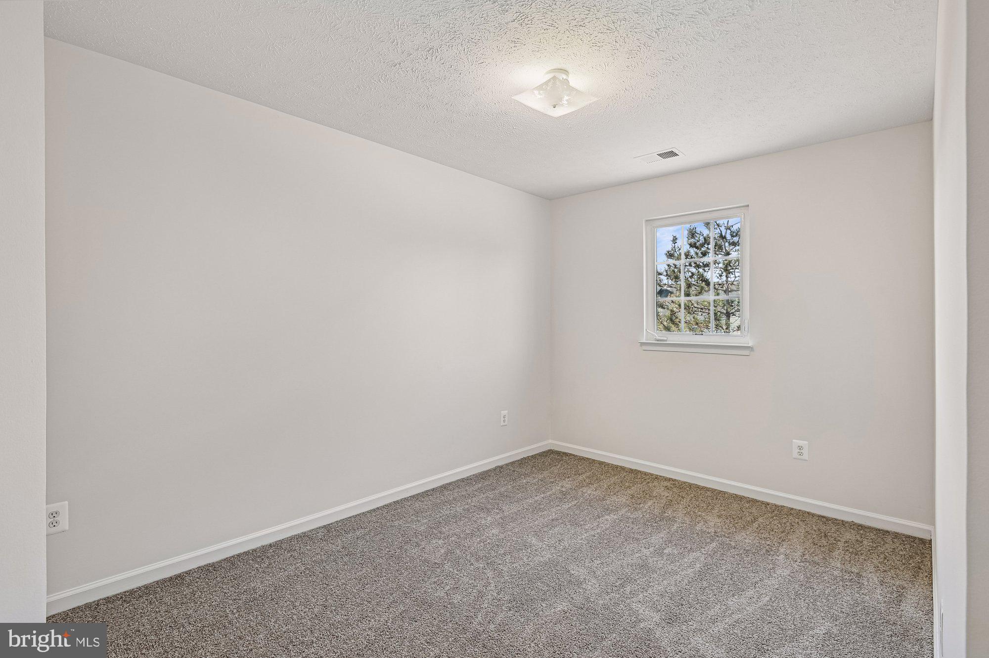 2670 Rainy Spring Court Odenton, MD 21113 - Photo 27 of 79 an empty room with a window