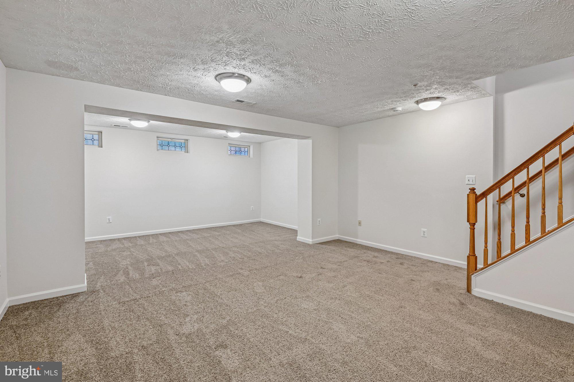 2670 Rainy Spring Court Odenton, MD 21113 - Photo 49 of 79 a view of an empty room with stairs