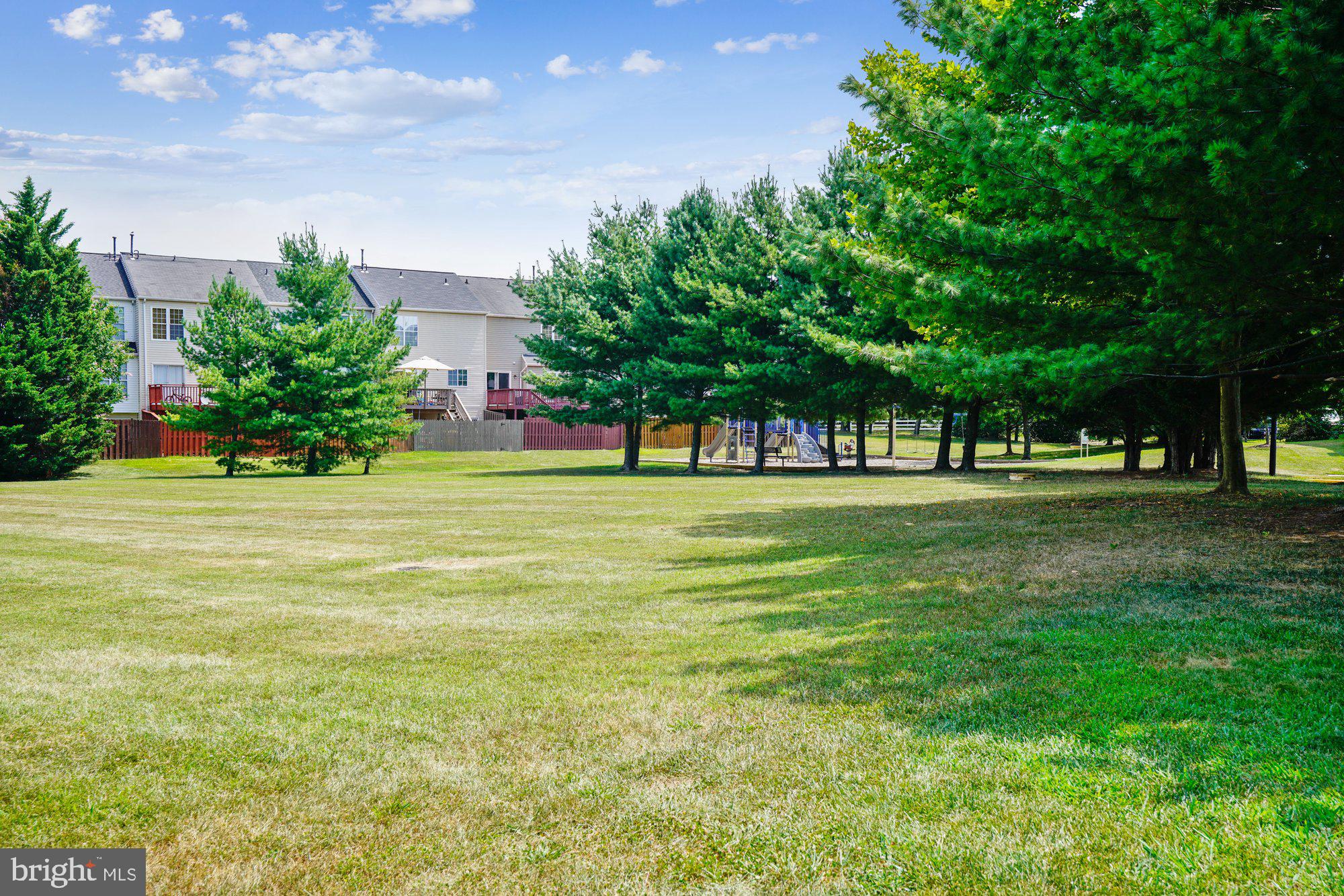 2670 Rainy Spring Court Odenton, MD 21113 - Photo 75 of 79 a view of green field with benches and trees