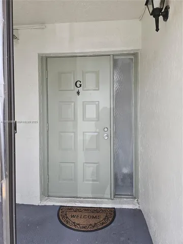 a view of a bathroom with shower