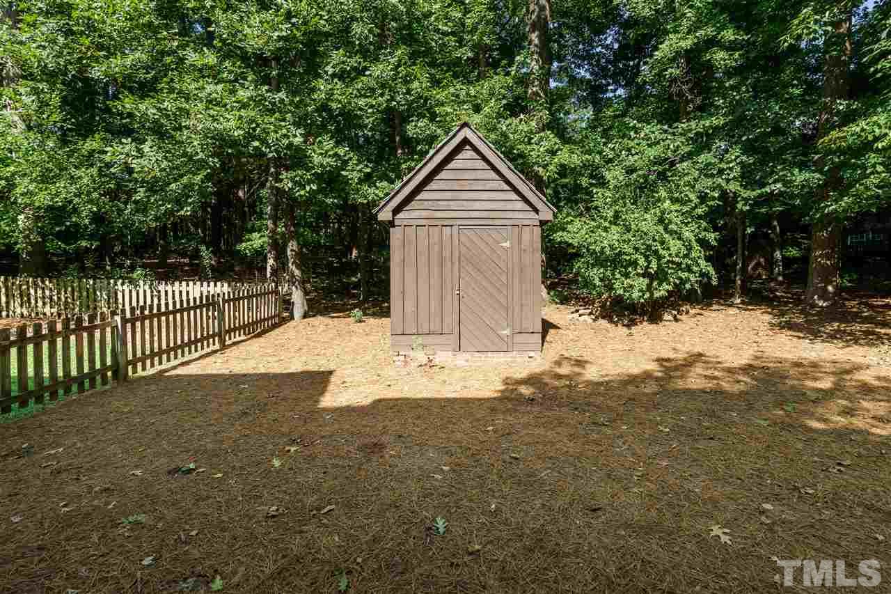 1101 Hymettus Court Raleigh, NC 27607 - Photo 24 of 25 a view of a backyard with large trees