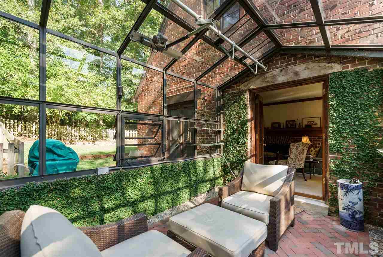 1101 Hymettus Court Raleigh, NC 27607 - Photo 10 of 25 a view of a patio with couches table and chairs and potted plants