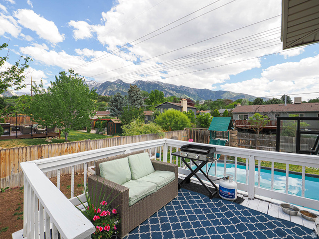 2444 Quail Run Drive Sandy, UT 84093 - Photo 18 of 23 Lovely deck and open mountain views
