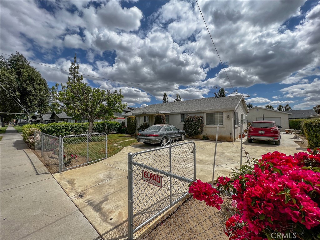 5759 Montgomery Street Riverside, CA 92503 - Photo 1 of 1 a view of a lake with couches under an umbrella