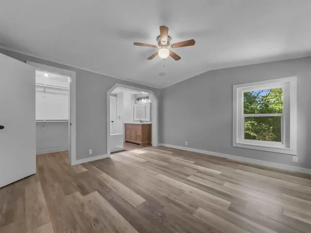 a bathroom with a sink a mirror and bathtub