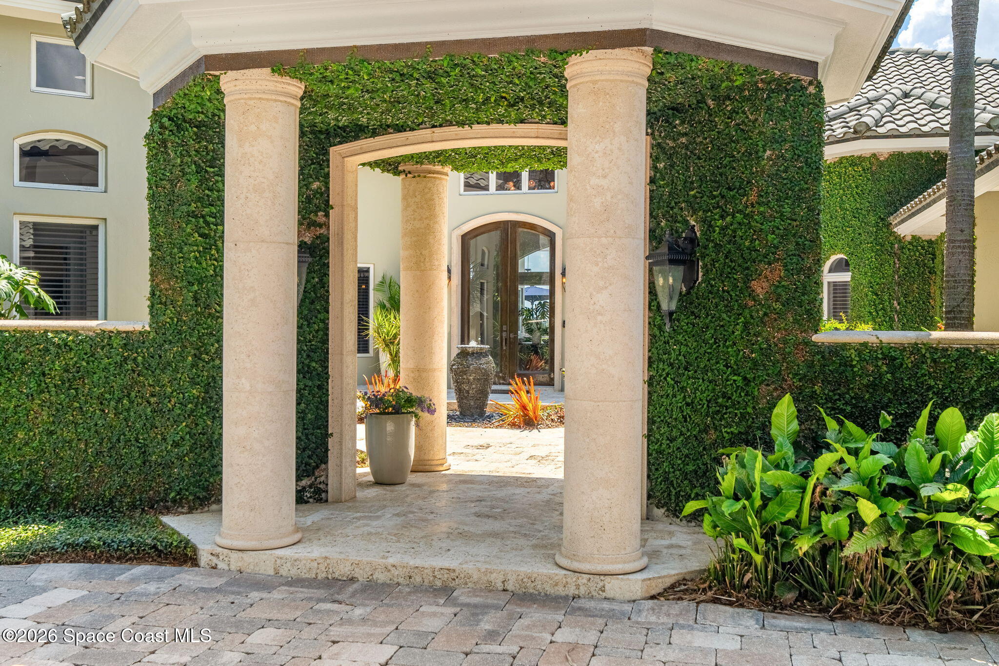 200 Riverside Drive Melbourne Beach, FL 32951 - Photo 10 of 103 Front Entry Views