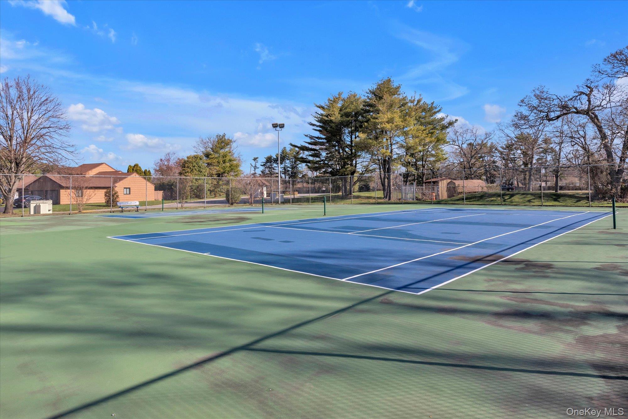 32 Ashley Circle Commack, NY 11725 - Photo 17 of 23 a view of a tennis court