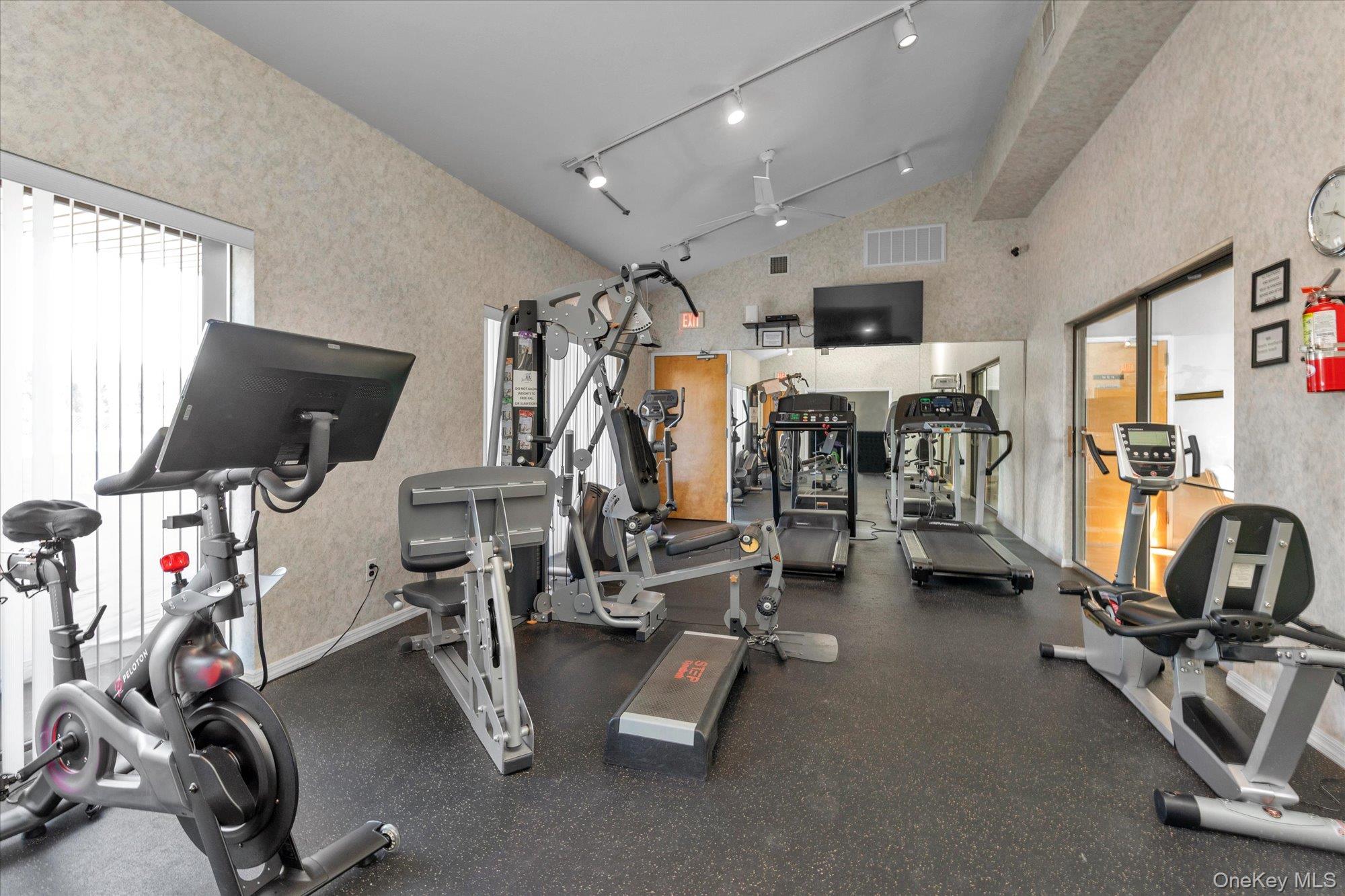 32 Ashley Circle Commack, NY 11725 - Photo 21 of 23 a view of a room with gym equipment