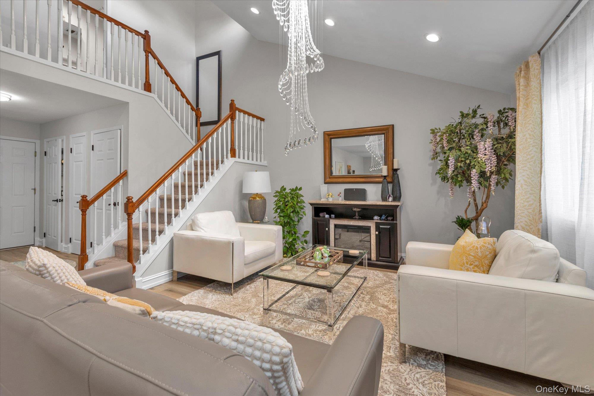 32 Ashley Circle Commack, NY 11725 - Photo 3 of 23 a living room with furniture and a flat screen tv