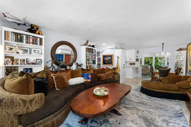 a view of a dining room with furniture and window